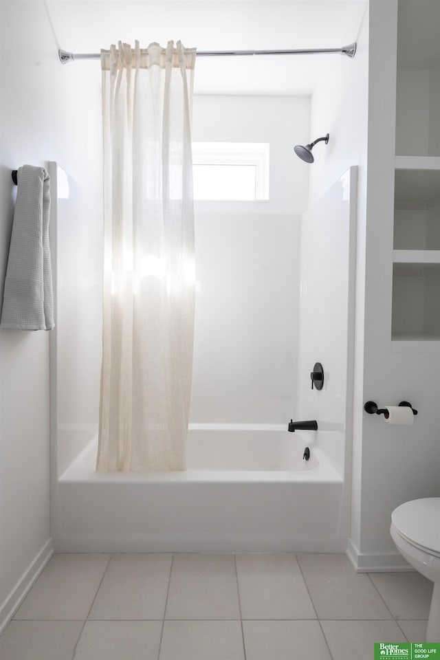 5301 Elmwood Plz, Omaha, NE 68106 - full bath featuring shower / tub combo, tile patterned floors, toilet, and baseboards