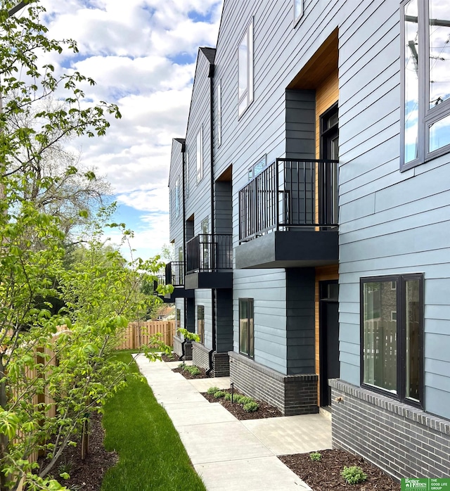 5301 Elmwood Plz, Omaha, NE 68106 - view of side of home with a balcony
