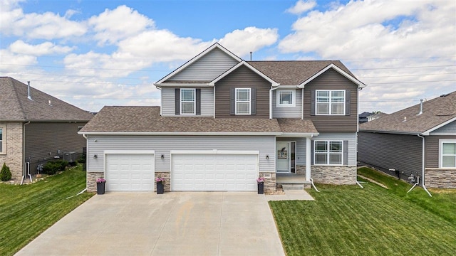 20904 Camden Ave, Omaha, NE 68022 - view of front facade featuring stone siding, driveway, a front yard, and a shingled roof