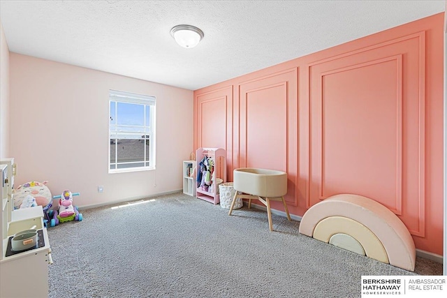 20904 Camden Ave, Omaha, NE 68022 - rec room with carpet and baseboards