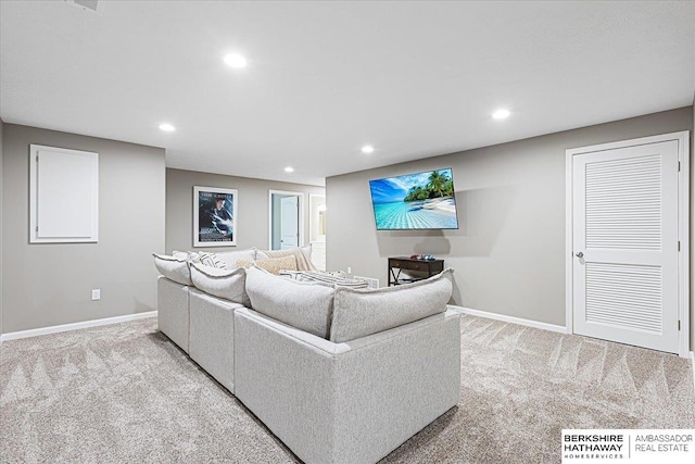 20904 Camden Ave, Omaha, NE 68022 - living area with light colored carpet, baseboards, and recessed lighting