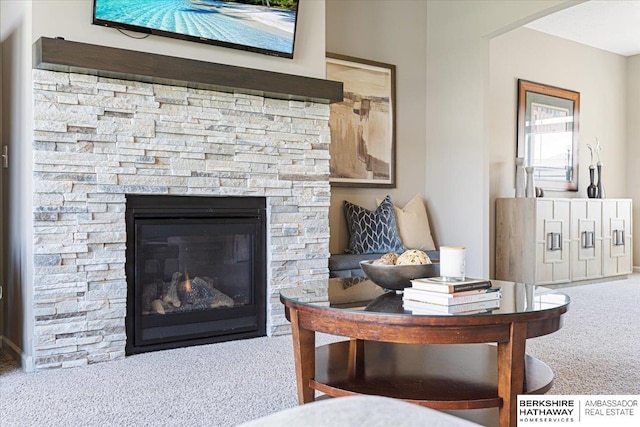 20904 Camden Ave, Omaha, NE 68022 - living room with carpet floors and a stone fireplace