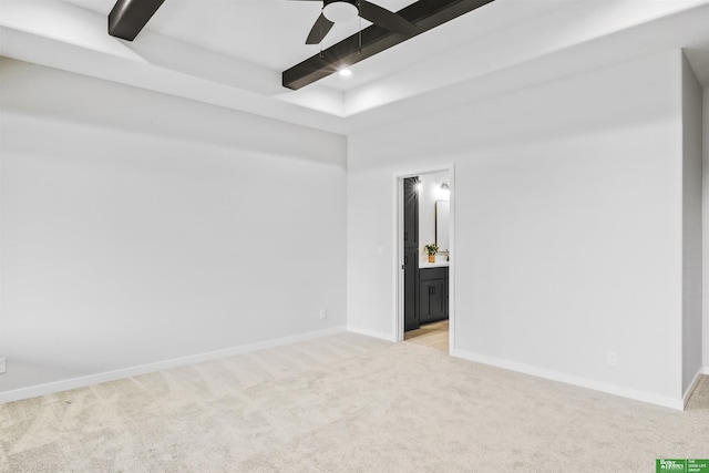 5508 N 212th St, Elkhorn, NE 68022 - spare room featuring light colored carpet, baseboards, and a ceiling fan