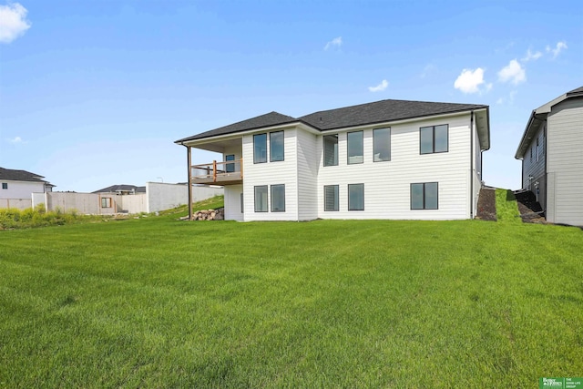 5508 N 212th St, Elkhorn, NE 68022 - back of house featuring a lawn and a balcony