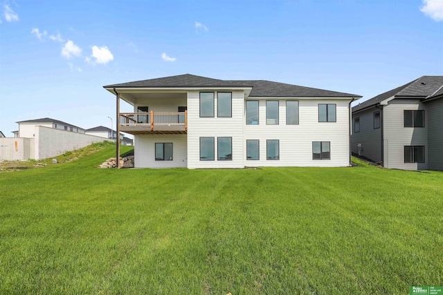 5508 N 212th St, Elkhorn, NE 68022 - rear view of house with a lawn and a shingled roof