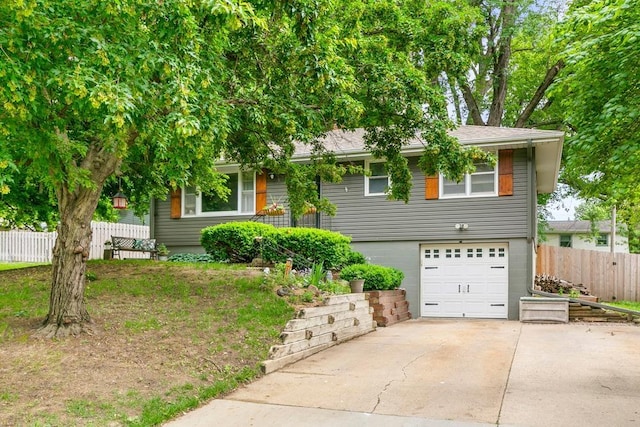 10917 Spring St, Omaha, NE 68144 - view of front of house featuring an attached garage and driveway