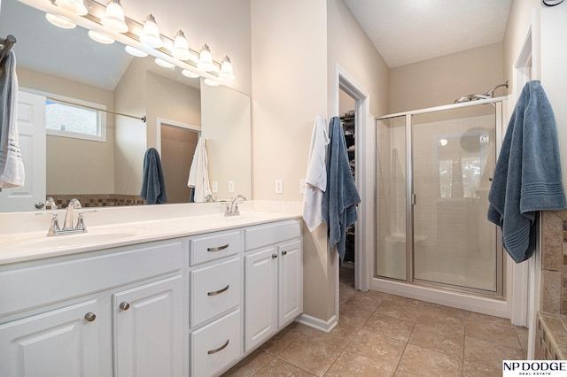 7409 N 160th St, Bennington, NE 68007 - full bathroom featuring double vanity and a stall shower
