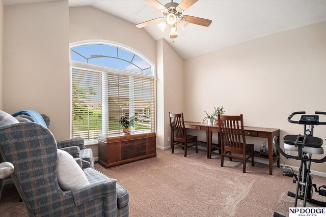 7409 N 160th St, Bennington, NE 68007 - living area featuring carpet flooring, vaulted ceiling, plenty of natural light, a desk, and a ceiling fan