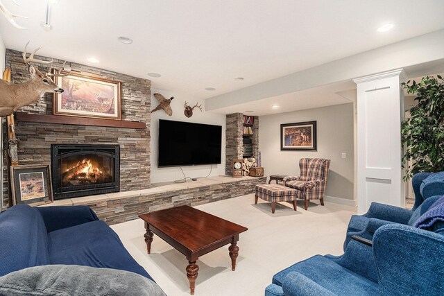 7409 N 160th St, Bennington, NE 68007 - living room featuring a stone fireplace and recessed lighting
