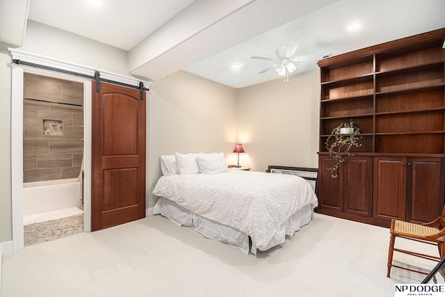 7409 N 160th St, Bennington, NE 68007 - bedroom featuring a barn door, carpet flooring, recessed lighting, ensuite bathroom, and ceiling fan
