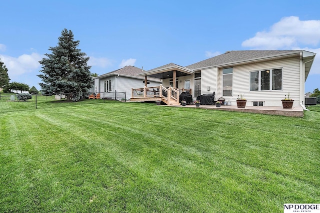7409 N 160th St, Bennington, NE 68007 - rear view of property with a wooden deck, a patio, and central AC unit