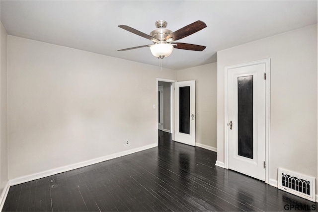 3519 N 53rd St, Omaha, NE 68104 - empty room featuring dark wood-style flooring, a ceiling fan, and baseboards