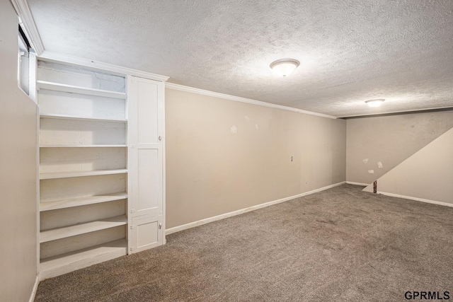 3519 N 53rd St, Omaha, NE 68104 - finished basement with carpet floors, ornamental molding, a textured ceiling, and baseboards