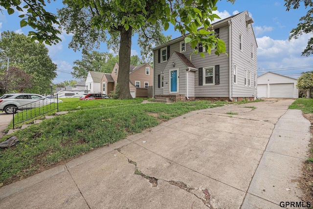 3519 N 53rd St, Omaha, NE 68104 - view of front of property featuring a garage, an outbuilding, and entry steps