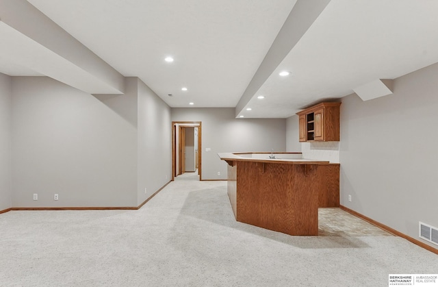 17616 Englewood St, Omaha, NE 68135 - bar area with recessed lighting, light colored carpet, baseboards, and a sink