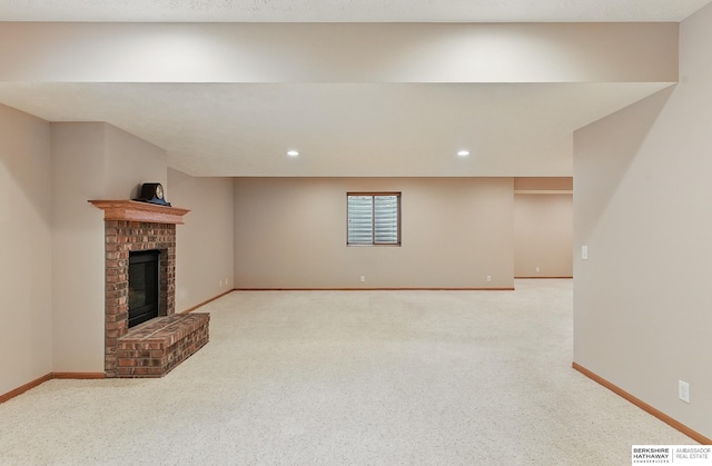 17616 Englewood St, Omaha, NE 68135 - unfurnished living room featuring a fireplace, light carpet, baseboards, and recessed lighting