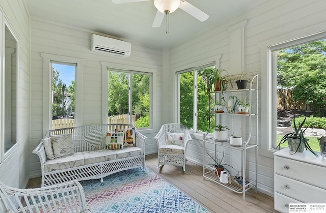 17616 Englewood St, Omaha, NE 68135 - sunroom / solarium featuring a wall unit AC, wood-type flooring, and plenty of natural light
