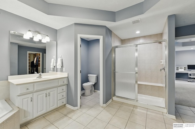 17616 Englewood St, Omaha, NE 68135 - bathroom with a shower stall, toilet, tile patterned floors, vanity, and baseboards