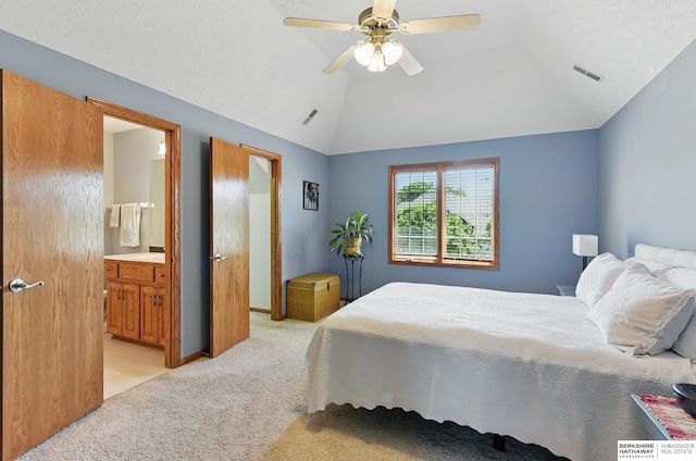 17616 Englewood St, Omaha, NE 68135 - bedroom featuring light colored carpet, lofted ceiling, ensuite bathroom, and ceiling fan
