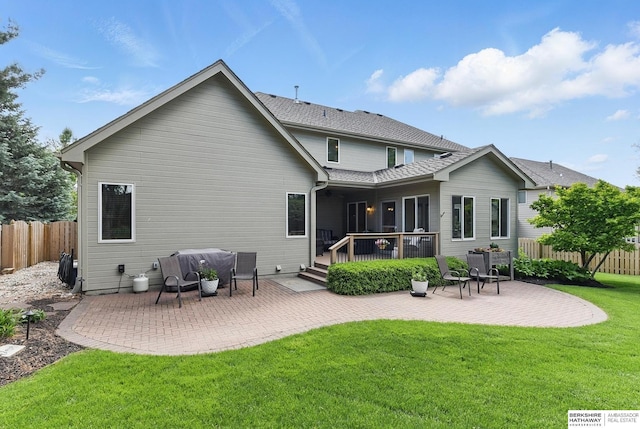 17616 Englewood St, Omaha, NE 68135 - rear view of house with a patio, a deck, and a shingled roof