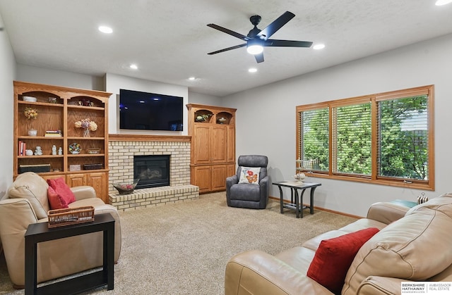 17616 Englewood St, Omaha, NE 68135 - carpeted living area with recessed lighting, a ceiling fan, a brick fireplace, and baseboards