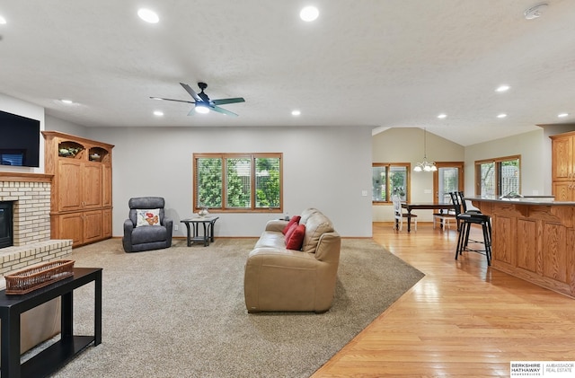 17616 Englewood St, Omaha, NE 68135 - living area with recessed lighting, plenty of natural light, a fireplace, ceiling fan, and light wood-type flooring