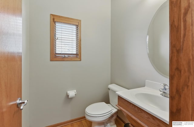 17616 Englewood St, Omaha, NE 68135 - bathroom with toilet, vanity, and baseboards