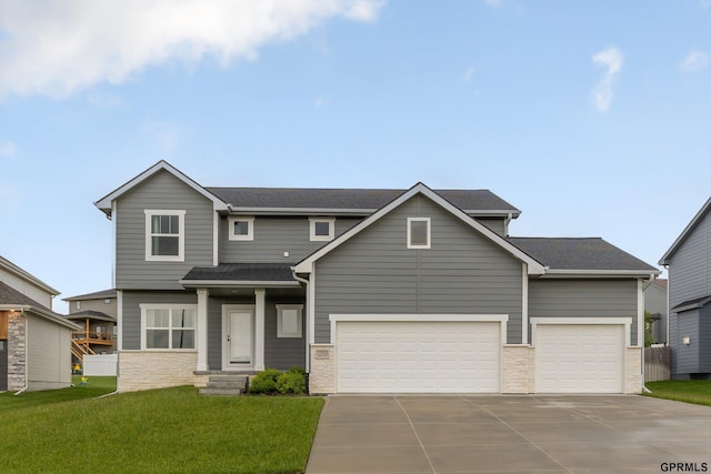 17312 Potter St, Bennington, NE 68005 - view of front of property featuring concrete driveway, a garage, a front yard, stone siding, and a shingled roof