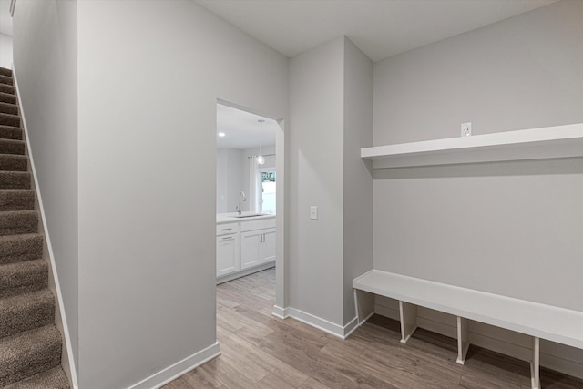 17312 Potter St, Bennington, NE 68005 - mudroom with light wood-style floors, a sink, baseboards, and recessed lighting