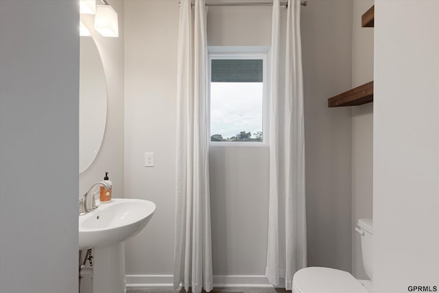 17312 Potter St, Bennington, NE 68005 - bathroom with toilet and baseboards