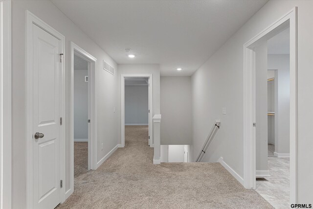 17312 Potter St, Bennington, NE 68005 - corridor featuring an upstairs landing, light carpet, recessed lighting, and baseboards