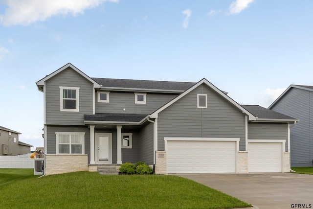 17312 Potter St, Bennington, NE 68005 - view of front of home featuring concrete driveway, stone siding, a garage, and a shingled roof