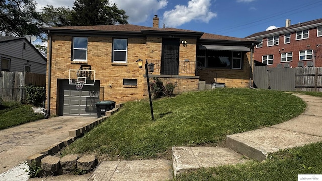 5218 Boyd St, Omaha, NE 68104 - view of front of home with a chimney, brick siding, driveway, and a garage