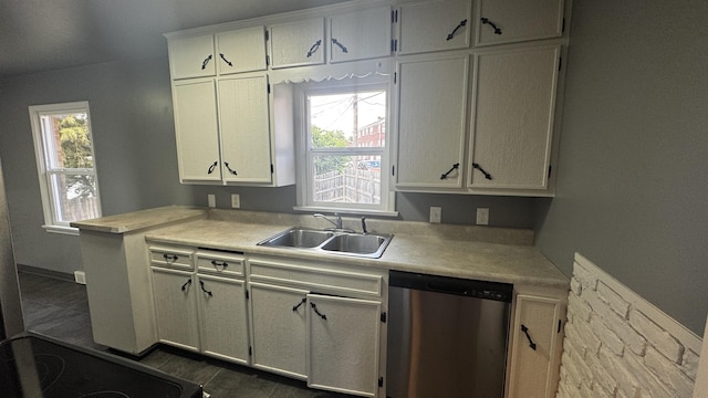 5218 Boyd St, Omaha, NE 68104 - kitchen with dishwasher, a sink, light countertops, and plenty of natural light