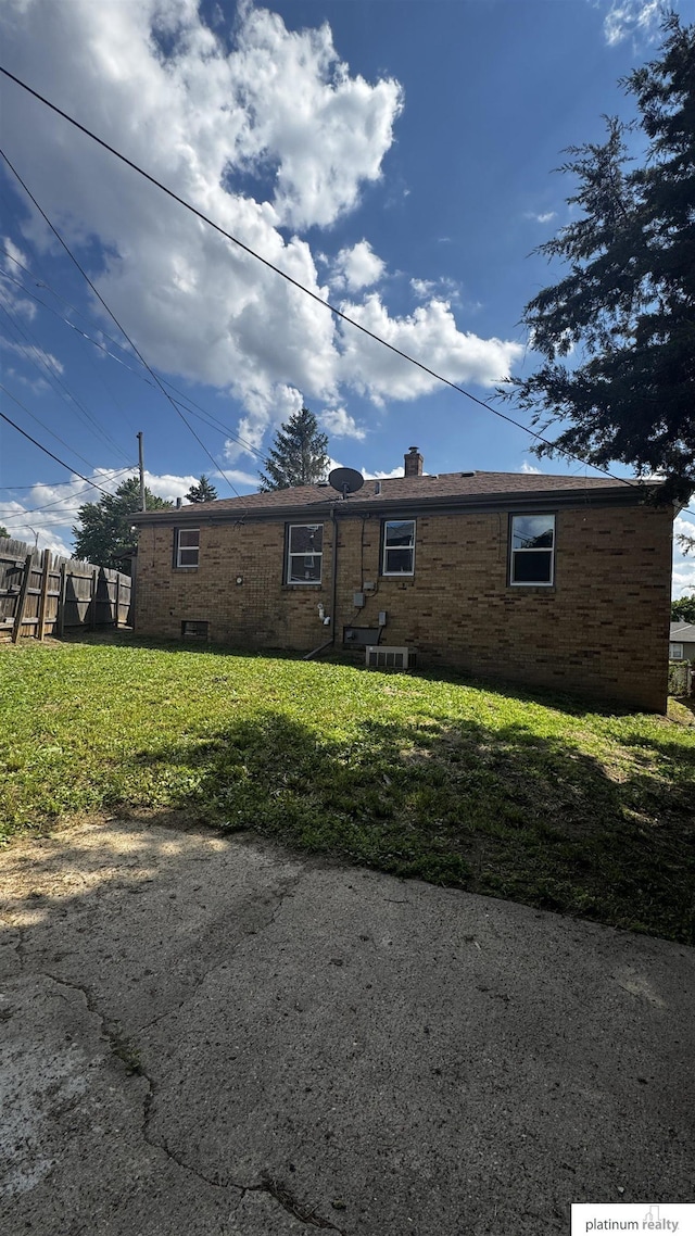 5218 Boyd St, Omaha, NE 68104 - view of front facade with brick siding and a chimney
