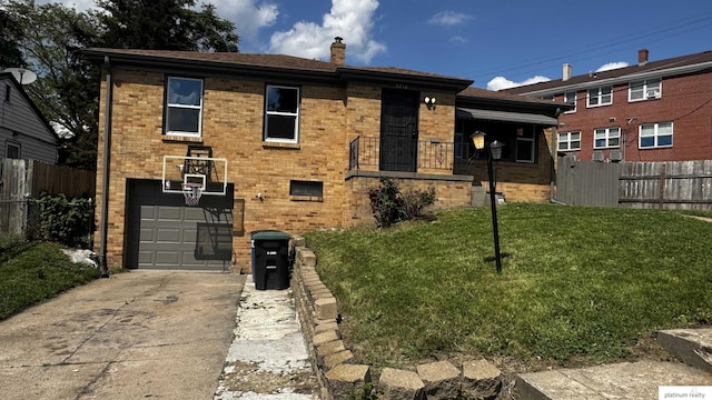 5218 Boyd St, Omaha, NE 68104 - view of front of property featuring concrete driveway, a chimney, a garage, and brick siding