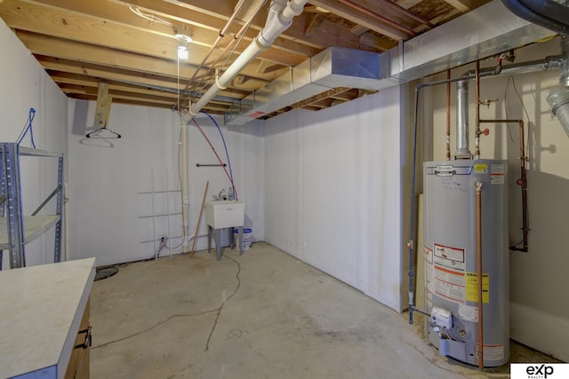 3003 Sheridan Rd, Bellevue, NE 68123 - unfinished below grade area with gas water heater and a sink