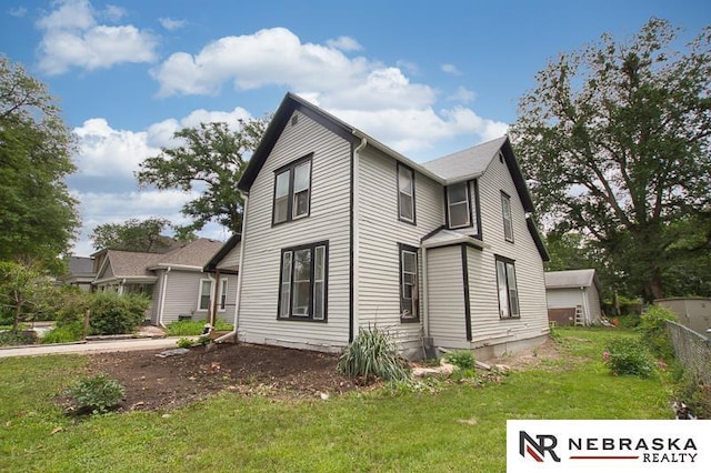 1801 Euclid Ave, Lincoln, NE 68502 - view of home's exterior featuring a yard