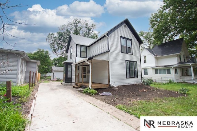 1801 Euclid Ave, Lincoln, NE 68502 - view of front facade featuring a porch