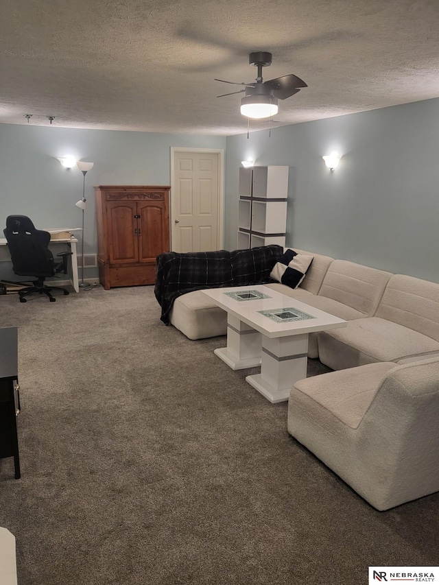 16228 Virginia St, Omaha, NE 68136 - living area featuring a textured ceiling, carpet, a ceiling fan, and a desk