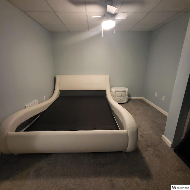 16228 Virginia St, Omaha, NE 68136 - carpeted bedroom featuring a drop ceiling, baseboards, and ceiling fan