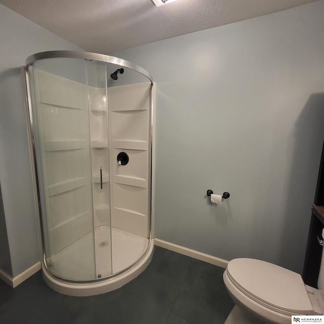16228 Virginia St, Omaha, NE 68136 - bathroom with a shower stall, baseboards, a textured ceiling, and toilet