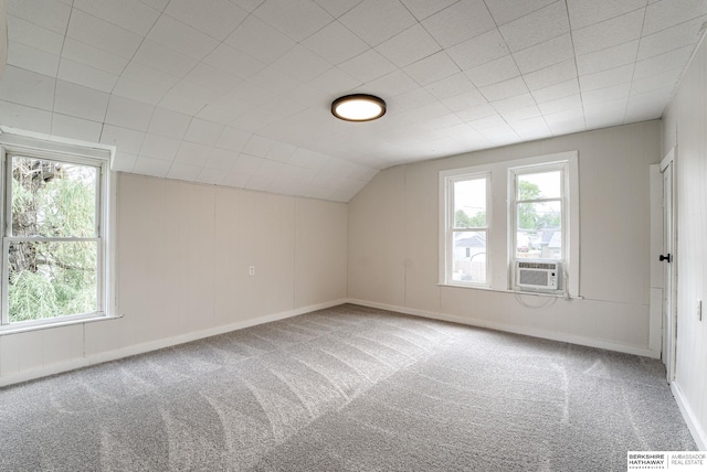 1943 Washington St, Blair, NE 68008 - bonus room featuring carpet, plenty of natural light, vaulted ceiling, baseboards, and cooling unit