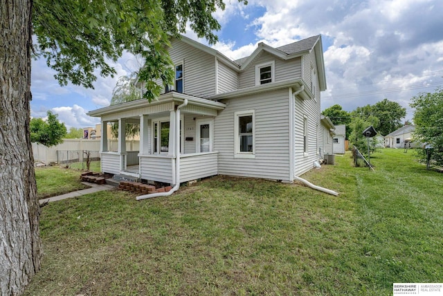 1943 Washington St, Blair, NE 68008 - view of front of property with covered porch and central AC unit