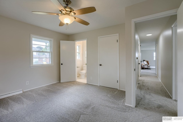 5002 S 77th Ave, Ralston, NE 68127 - unfurnished bedroom featuring light carpet, connected bathroom, baseboards, baseboard heating, and ceiling fan