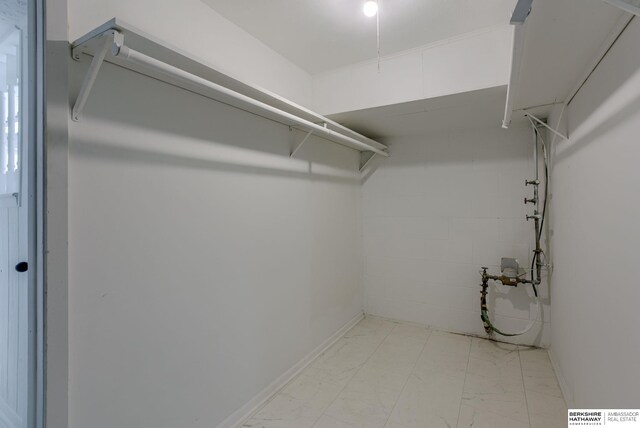 5002 S 77th Ave, Ralston, NE 68127 - spacious closet featuring light marble finish floors