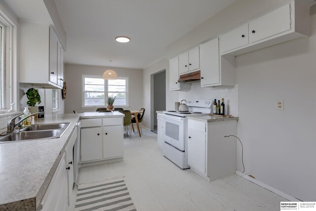 5002 S 77th Ave, Ralston, NE 68127 - kitchen with white electric range, a sink, under cabinet range hood, tasteful backsplash, and white cabinets