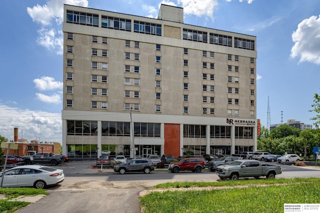 105 N 31st Ave Unit 502, Omaha, NE 68131 - view of building exterior with uncovered parking
