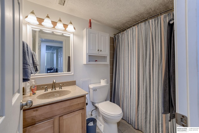 105 N 31st Ave Unit 502, Omaha, NE 68131 - full bathroom with toilet, vanity, a textured ceiling, tile patterned floors, and a shower with shower curtain