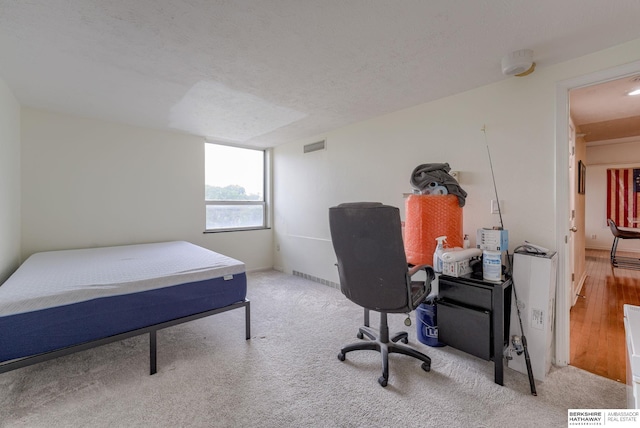105 N 31st Ave Unit 502, Omaha, NE 68131 - carpeted bedroom with an office area and baseboards